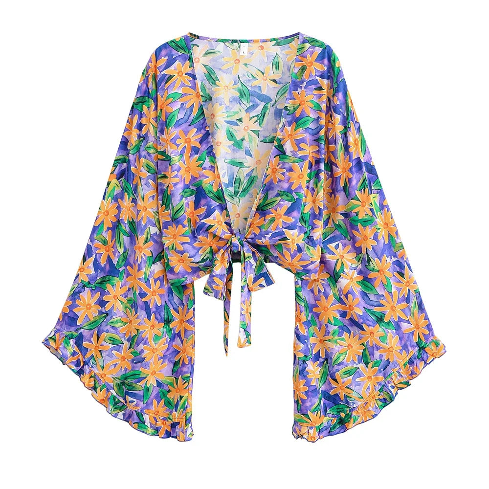 Krótkie kimono plażowe z szerokimi rękawami Lyra-lauranapl.com