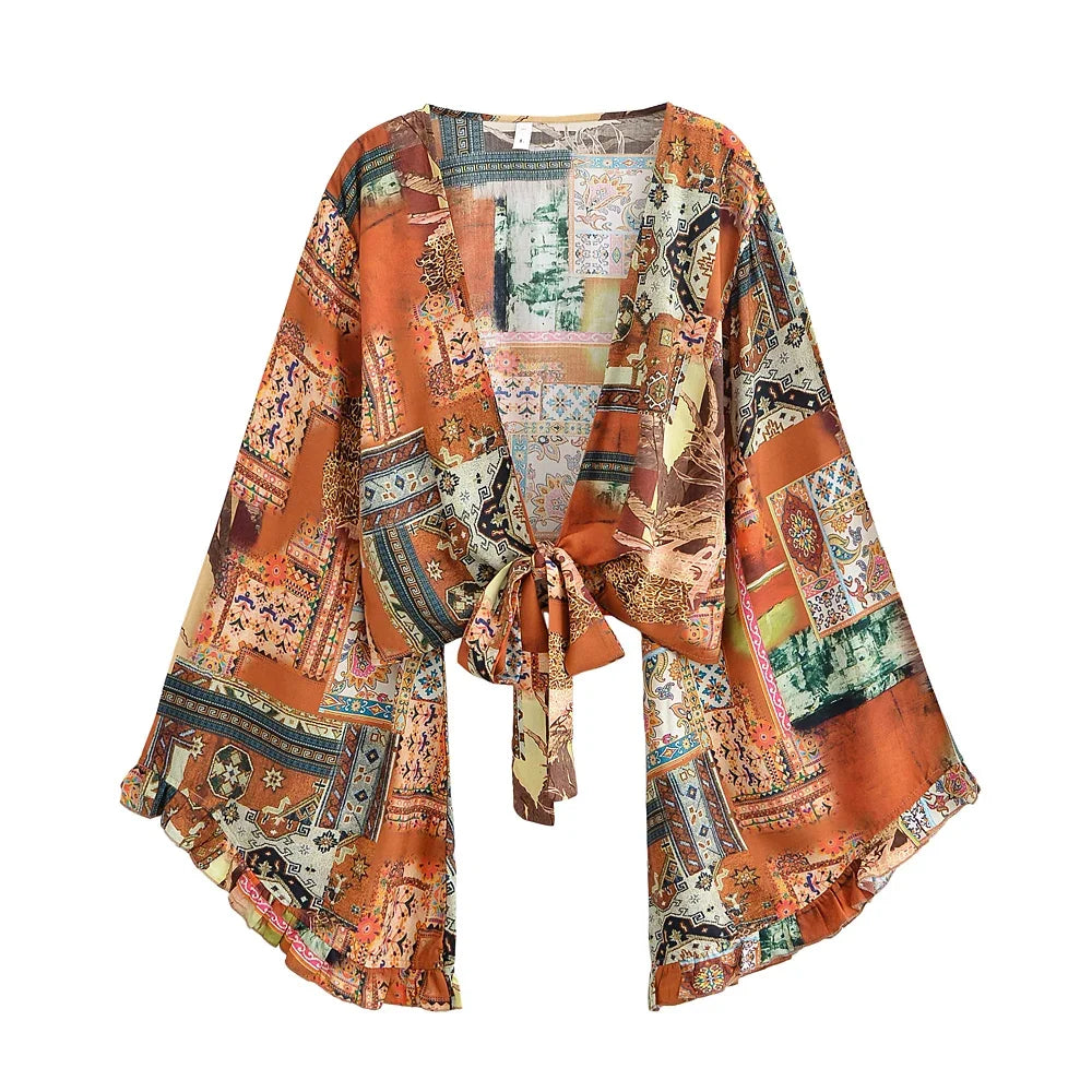 Krótkie kimono plażowe z szerokimi rękawami Lyra-lauranapl.com